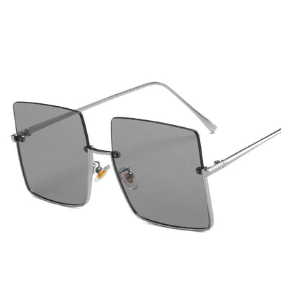 Half-frame square sunglasses with orange tinted lenses and gold-colored metal trim and temples. - Image 3