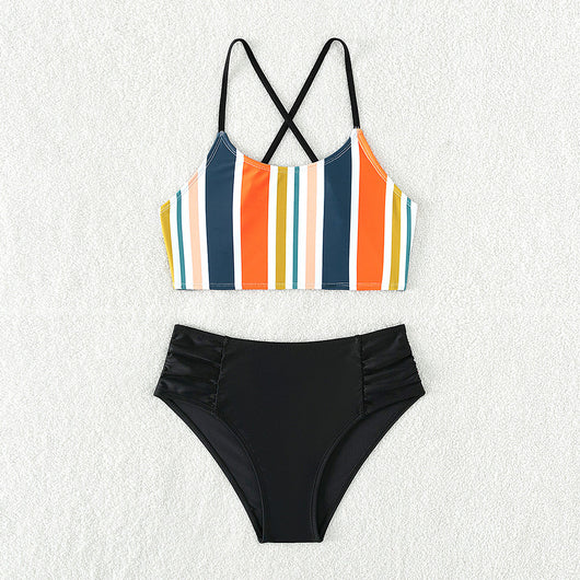Girls' two-piece bikini swimsuit with a colorful striped crop top and solid black high-waisted ruched bottoms. - Image 6