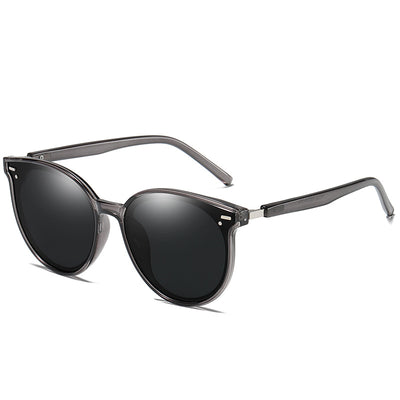 Transparent gray round frame polarized sunglasses with black-gray lenses on a white background. - Image 14