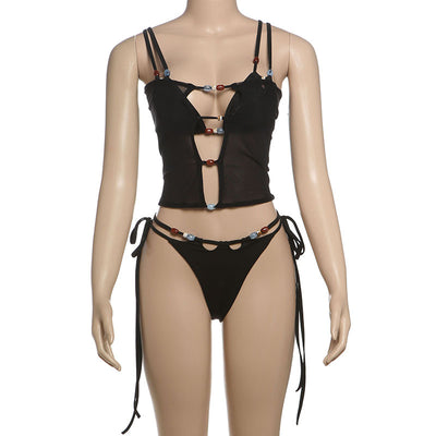 Women's fashionable three-piece bikini set with an abstract orange, brown, and blue print. Features a triangle top, mesh mini skirt, and lace-up details with be - Image 28