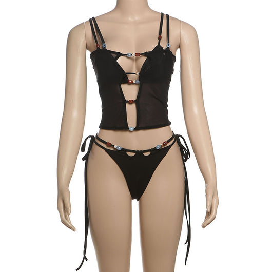 Women's fashionable three-piece bikini set with an abstract orange, brown, and blue print. Features a triangle top, mesh mini skirt, and lace-up details with be - Image 28
