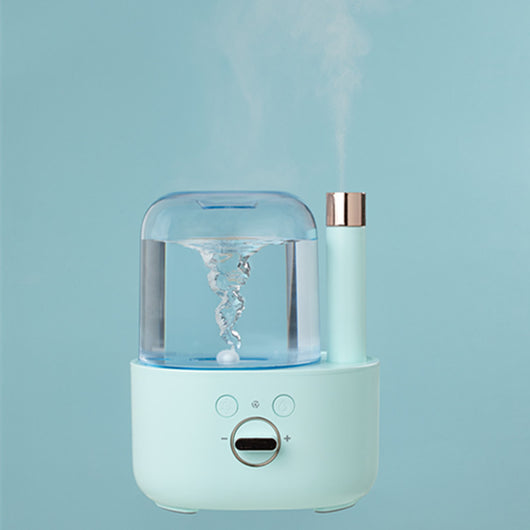 White and clear humidifier with a visible water vortex, emitting mist, and featuring a rose gold accent. - Image 7