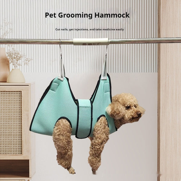 Grey polyester mesh pet grooming hammock with black trim and two leg openings, includes two silver S-hooks.