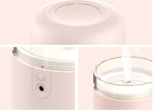 Light pink mini USB humidifier diffuser, shaped like a candle, with a clear top and visible mist output. - Image 14