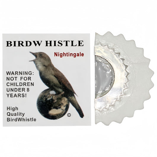 Red bird whistle with a serrated metal edge, next to a white label featuring a bird on a heart and a warning. - Image 10