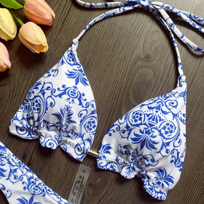 Women's blue and white porcelain print halter bikini with tie-side bottoms and blue tassels. - Image 4