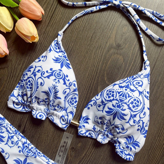 Women's blue and white porcelain print halter bikini with tie-side bottoms and blue tassels. - Image 4