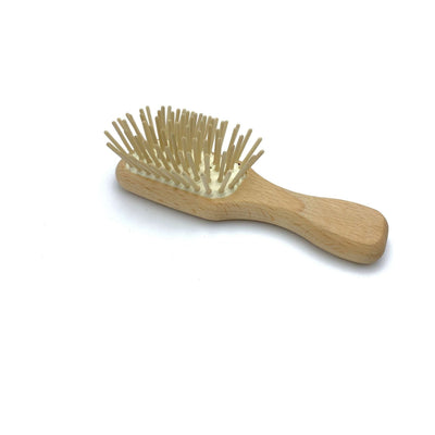 Cepillo Mini Masajeador de Goma con Cerdas Naturales y Madera de Haya