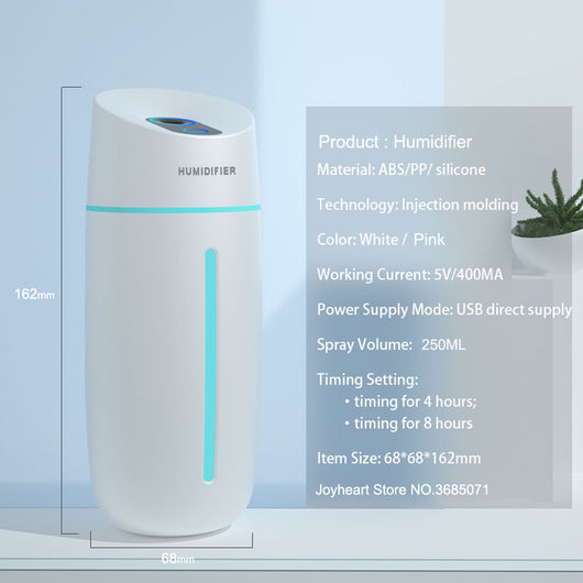 White desktop humidifier with blue LED light strip and control buttons, emitting mist on a wooden surface. - Image 3