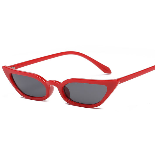 Red small frame cat-eye sunglasses with red tinted lenses on a white background. - Image 12