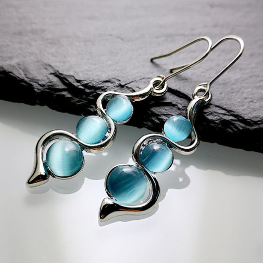Aretes Ondulados Estilo Bohemio con Gema Ojo de Gato - Image 4
