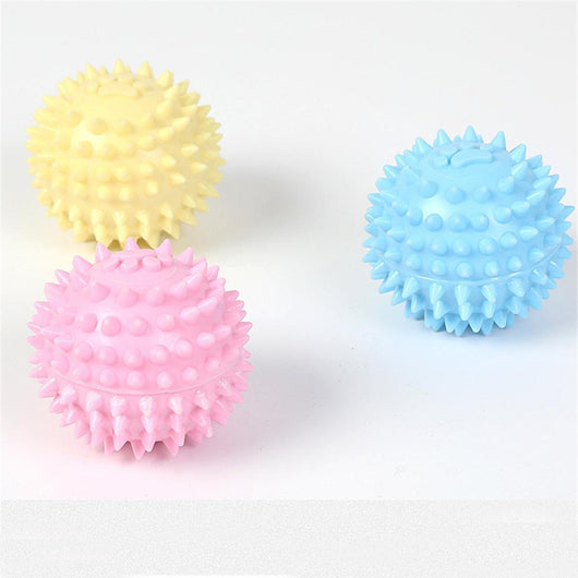 Yellow spiky pet toy ball with a paw print design, made from TPR for interactive play and molars. - Image 6