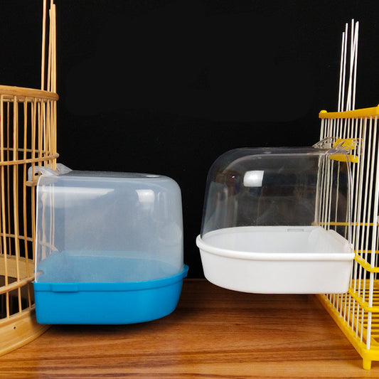 Clear plastic bird bath with a blue base, designed to attach to a yellow and white bird cage.