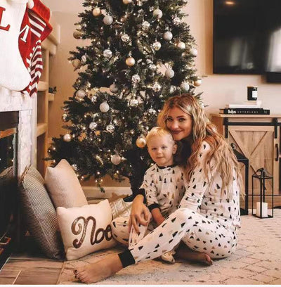 White long-sleeve pajama set with black and brown Christmas tree print, featuring black cuffs and collar. - Image 14