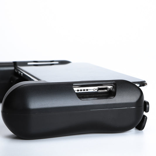 Black mobile game controller with integrated cooling fan and ergonomic grips for smartphones. - Image 2