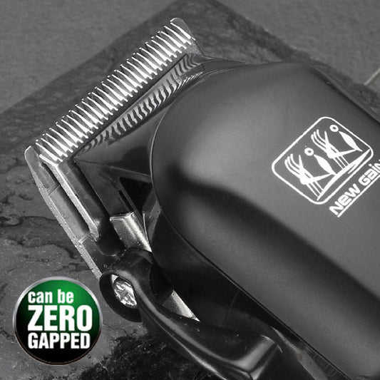 Black electric hair clipper with a silver blade, digital display showing '100', and a hanging loop. - Image 2