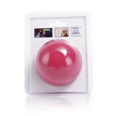 Red rubber elastic solid ball dog toy in clear blister packaging with images of dogs playing. - Image 9