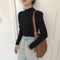 Blusa Tejida Cuello Alto con Mangas Abullonadas