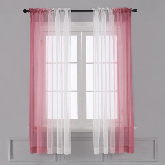 Pink and white gradient sheer rod pocket curtain panels hung on a black rod in front of a window. - Image 7