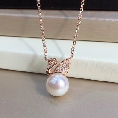 Aretes de Plata S925 con Perla de Agua Dulce Diseño Cisne - Image 2