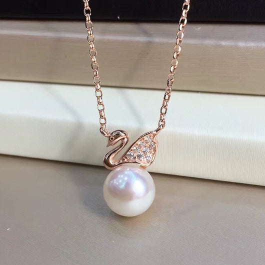 Aretes de Plata S925 con Perla de Agua Dulce Diseño Cisne - Image 2