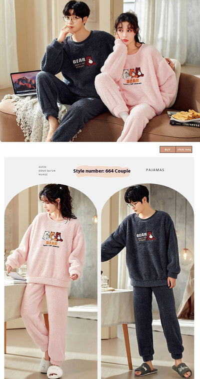 Couple wearing matching cream coral fleece pajamas with gray pants and bear embroidery, seated on a bed. - Image 25
