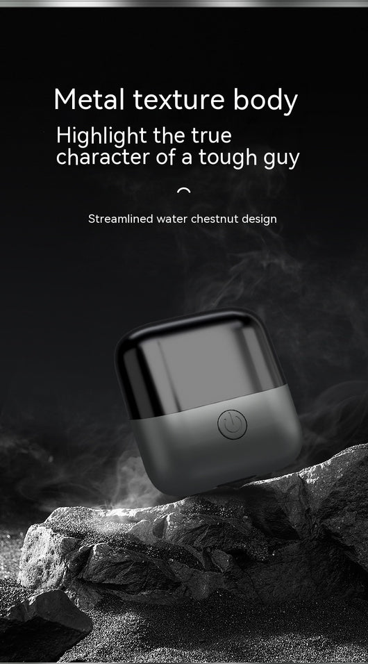 Silver mini electric shaver with a double-headed rotary design and a black power button on top. - Image 22