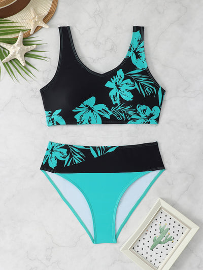 Women's two-piece swimsuit with black and purple floral print. Features a V-neck sports bra top and mid-rise bottom. - Image 8