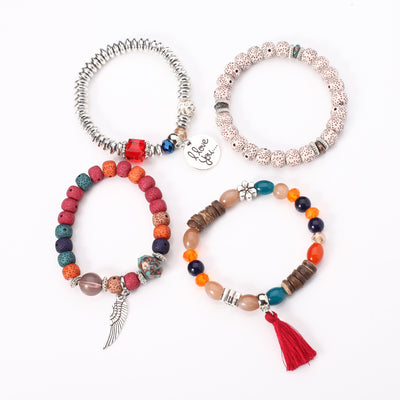 Pulsera Cristal Piedra Volcánica Multicapa con Borla Ala para Mujer - Image 4