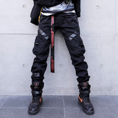 Pantalón Cargo Hip Hop con Bolsillos Laterales y Detalles en Cuero
