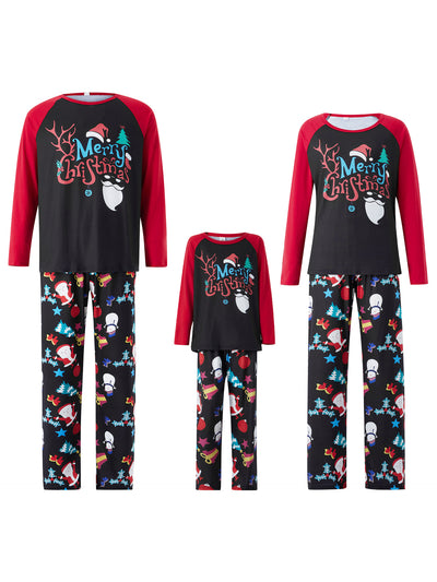 Man wearing a black and red long-sleeve Christmas pajama set with "Merry Christmas" graphic and Santa print pants. - Image 8