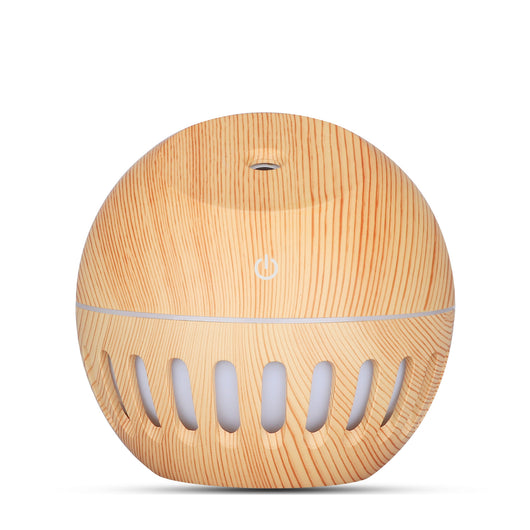 White portable home office humidifier with a spherical base, dome top, and glowing blue LED light accents. - Image 7