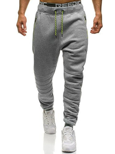 Pantalones deportivos casuales con detalles de costura y cierre - Image 4