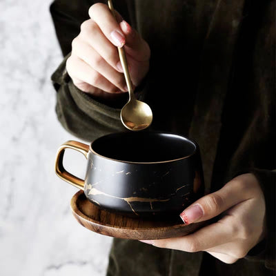 Taza de cerámica con acabado dorado - Image 2