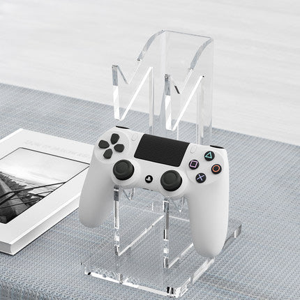 Black AOLION universal gamepad stand made of ABS plastic, designed to hold a game controller upright. - Image 13