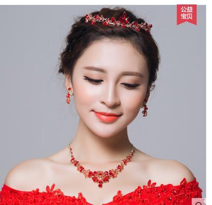 Red rhinestone bridal jewelry set featuring a floral necklace and matching dangle earrings on a model. - Image 5