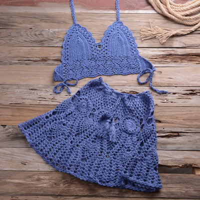 Light beige crochet bikini set with a halter crop top and a matching open-knit mini skirt with tassels. - Image 34