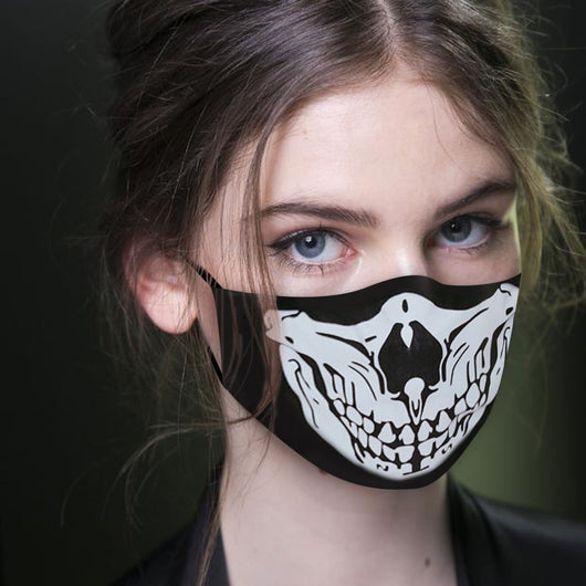 Young woman wearing a black ear hook facial mask with a white skull design, perfect for Halloween. - Image 5