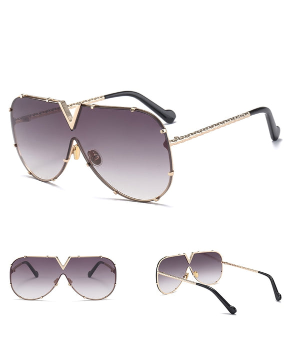 Gafas de Sol Unisex Rimless con Remaches - Estilo Minimalista y Versátil