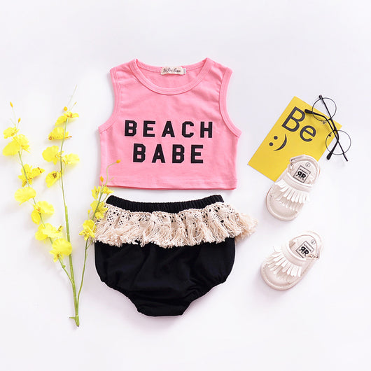 Conjunto Playero Beach Babe - Top Crop sin Mangas y Short Triangular con Flecos