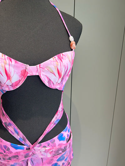 Women's two-piece swimsuit with a halter bikini top and a matching long skirt, featuring a vibrant tropical and animal print. - Image 10