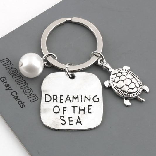 Llavero Personalizado Perla Marina - Accesorio Metálico de Verano - Image 2