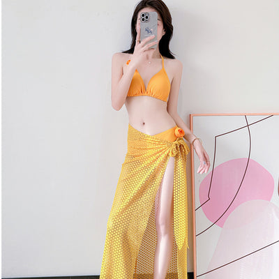 Women's light purple three-piece bikini set with a triangle halter top, bottoms, and a mesh sarong with rose details. - Image 8
