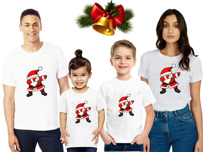 Family matching white Christmas t-shirts and baby bodysuit with 'Merry Christmas' graphic, paired with black and white plaid pajama bottoms. - Image 5