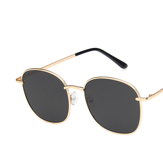 Gold metal round sunglasses with dark gray resin lenses and black temple tips on a white background. - Image 8