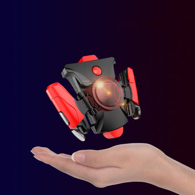 Black and red mobile phone gamepad with mechanical buttons floating above an open hand. - Image 8
