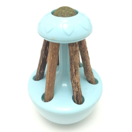 Pink tumbler cat toy with a green catnip ball on top and several natural wooden sticks for chewing. - Image 6