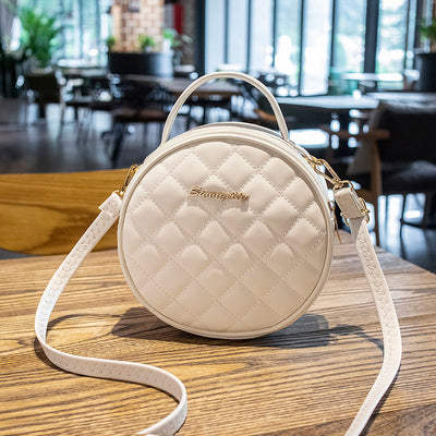 Bolso Redondo Pequeño con Bordado de Rombo y Diseño Asimétrico - Image 8