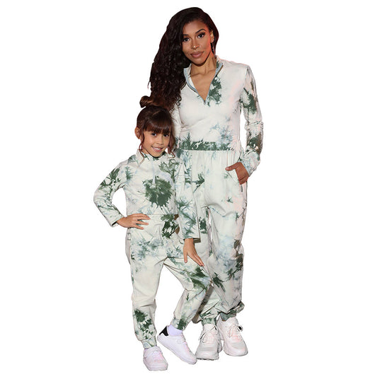 Mother and daughter wearing matching white, green, and blue tie-dye long-sleeved sweater and jogger sets. - Image 2