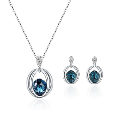 Silver-tone necklace and drop earrings set with blue cushion-cut crystals and clear accents, ideal for bridal wear. - Image 2